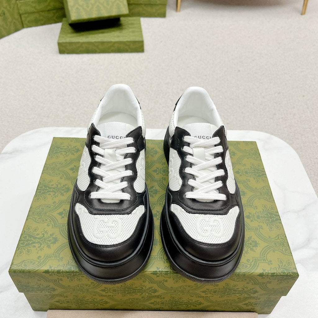 GUCCI EMBOSSED TRAINER BLACK AND WHITE CALFSKIN